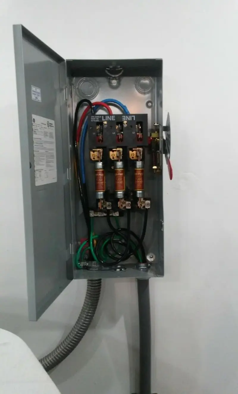 Three-phase disconnect switch installed for Smoke Detector Installation in Grain Valley